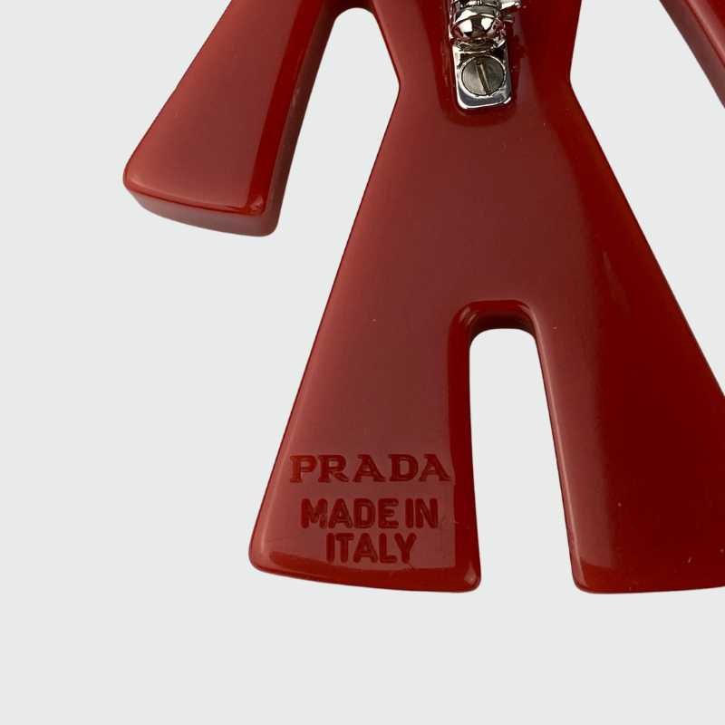 Prada Anstecker Männchen Rot